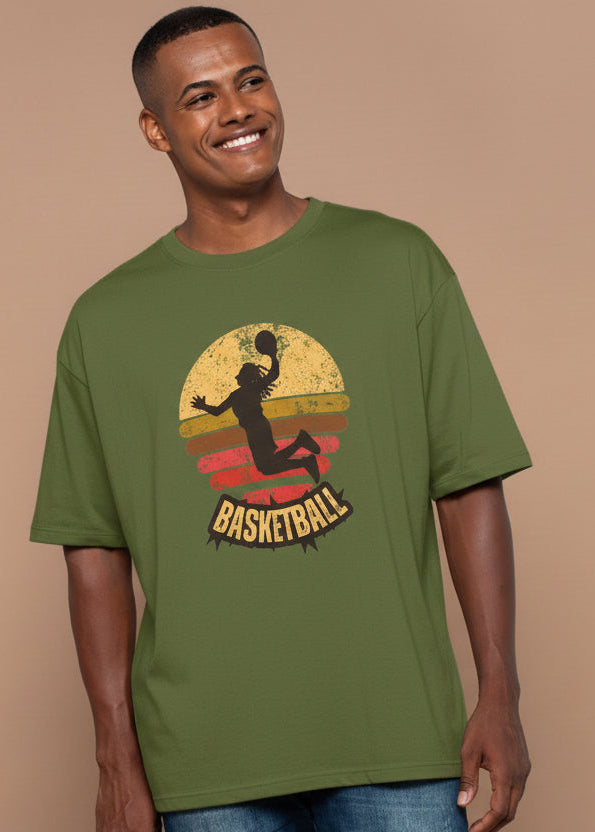 Man wearing a green t-shirt with a basketball design against a beige background