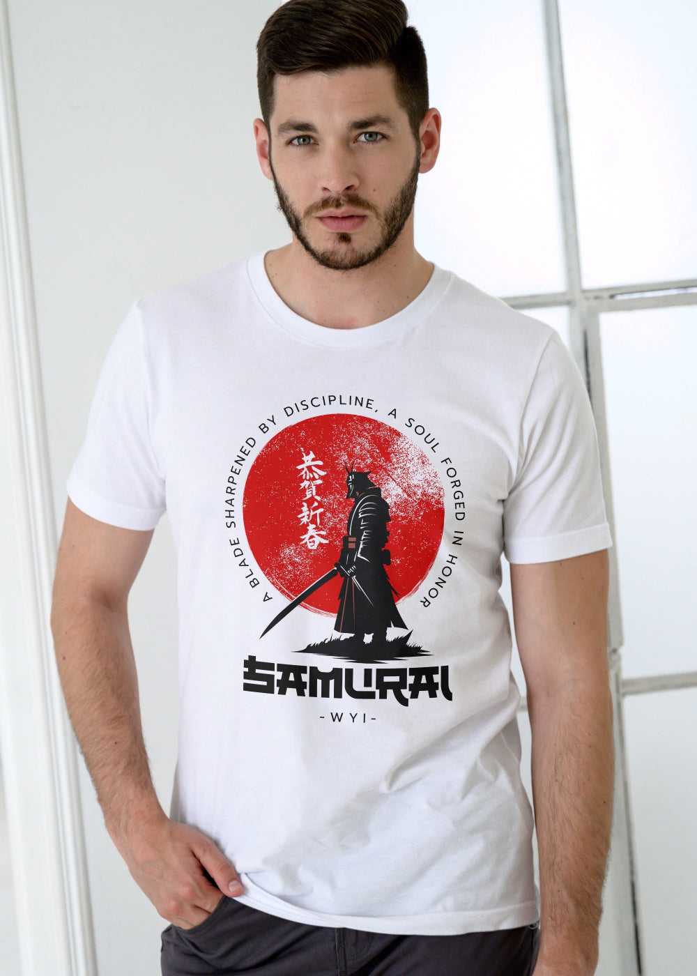 Man wearing a white t-shirt with a Samurai design on a light background
