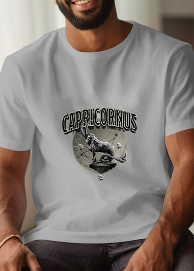 Person wearing a t-shirt with 'Caucasus' design sitting on a couch.