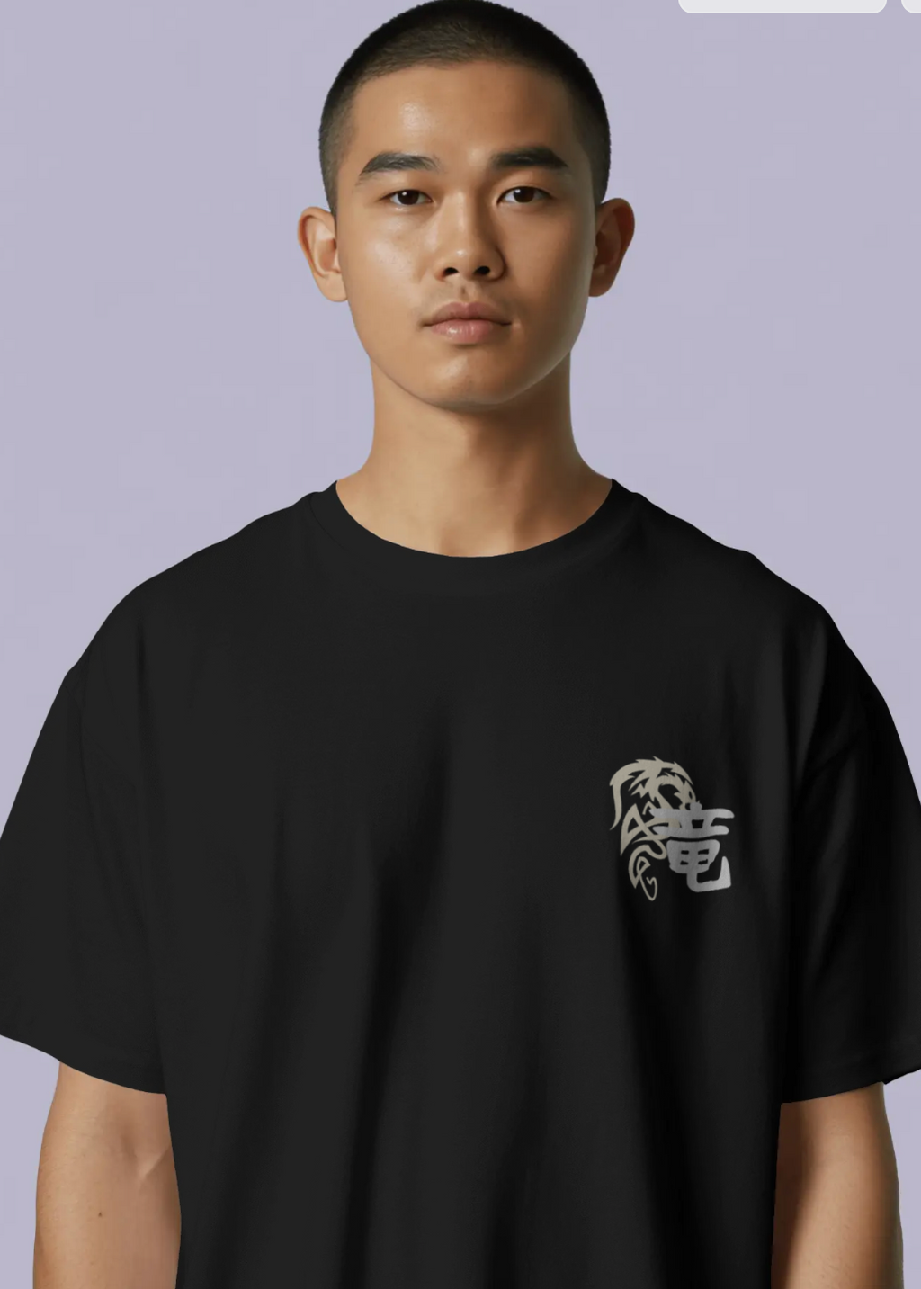 Person wearing a black t-shirt with a white logo on a plain background