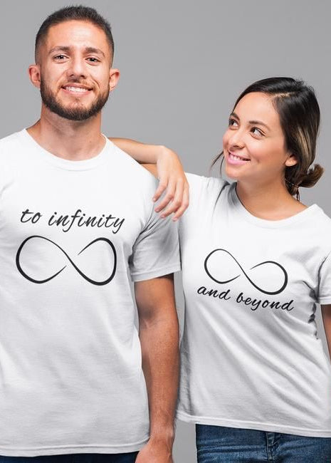 Two people wearing matching white t-shirts with infinity symbol and text on a gray background