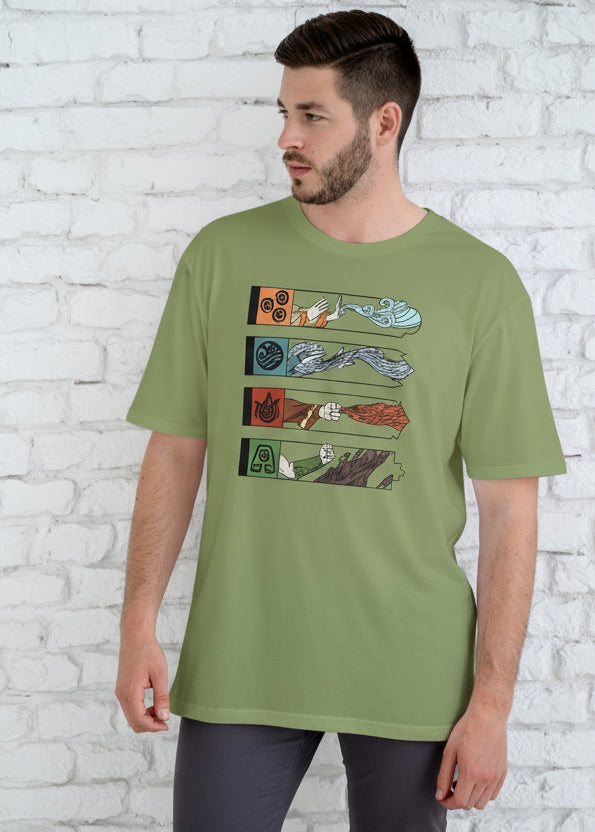 Man wearing a green t-shirt with graphic design against a white brick wall