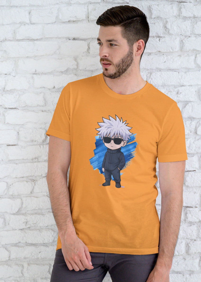 Man wearing an orange t-shirt with a graphic design against a white brick wall.