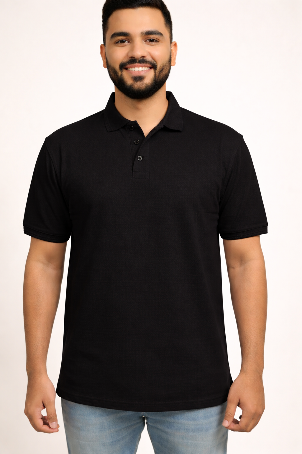 Man wearing a black polo shirt against a white background