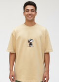 WYI Beige t-shirt with a small snoopy graphic on a plain background